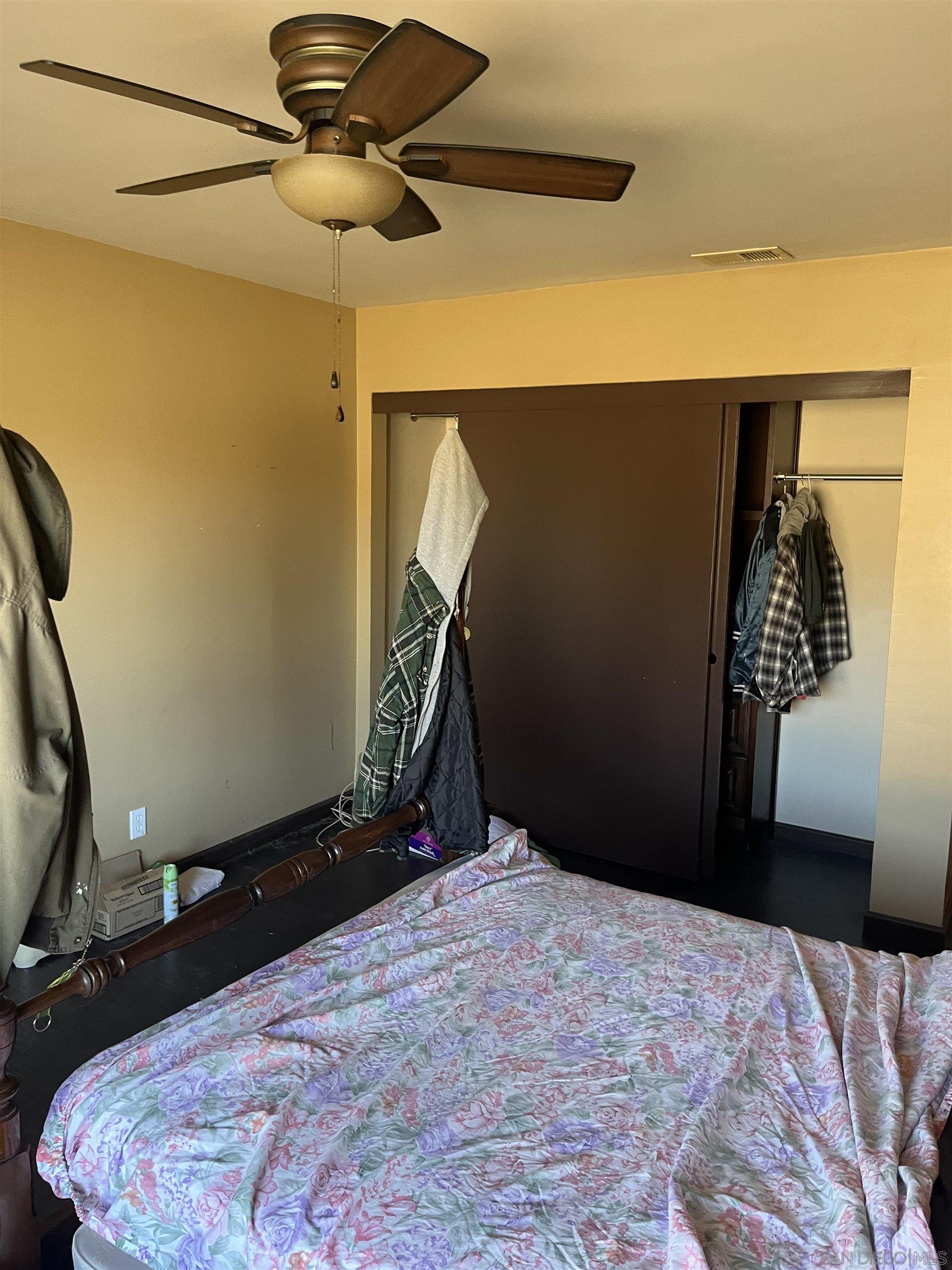 1407 Taylor Vista Vista, CA 92084 - Photo 17 of 28 a bedroom with a bed and a air conditioner