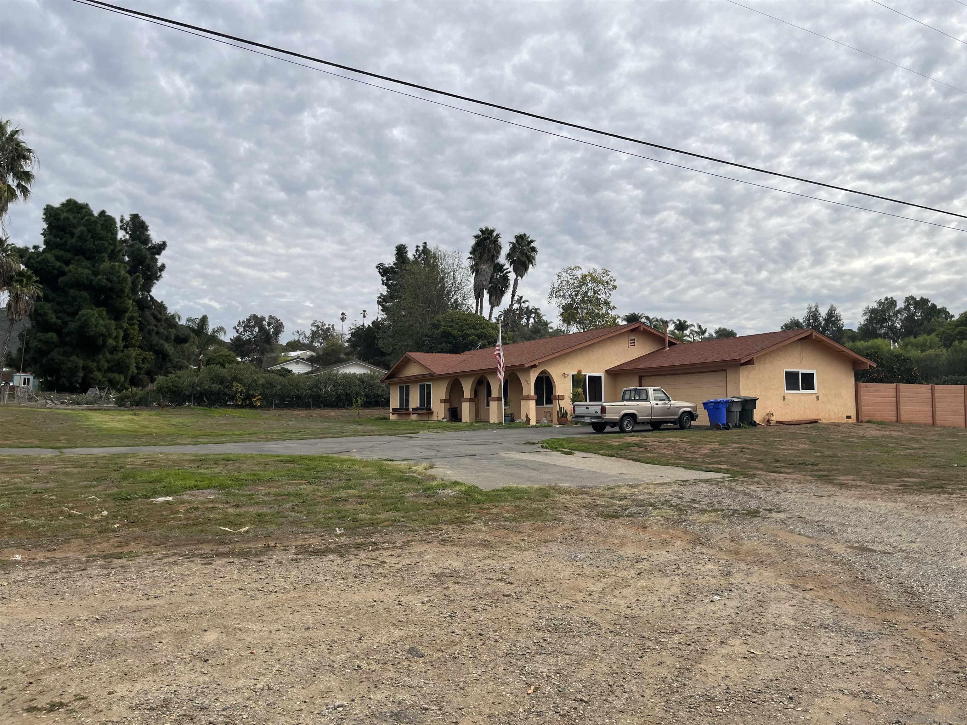 1407 Taylor Vista Vista, CA 92084 - Photo 2 of 28 a view of a house with a yard