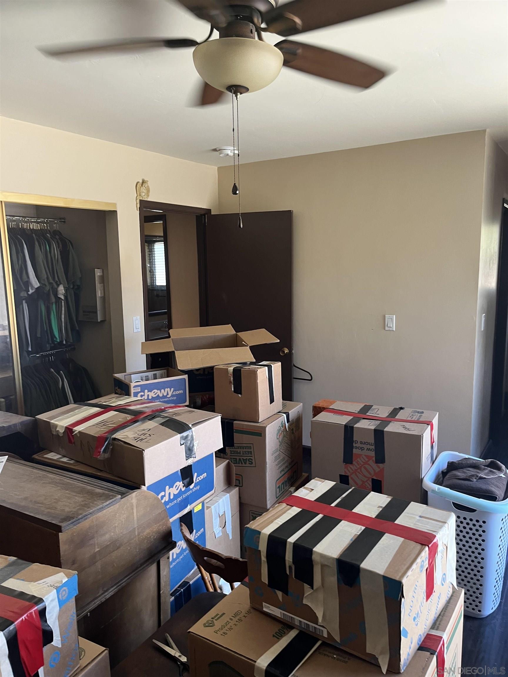 1407 Taylor Vista Vista, CA 92084 - Photo 22 of 28 a room with furniture and a flat screen tv