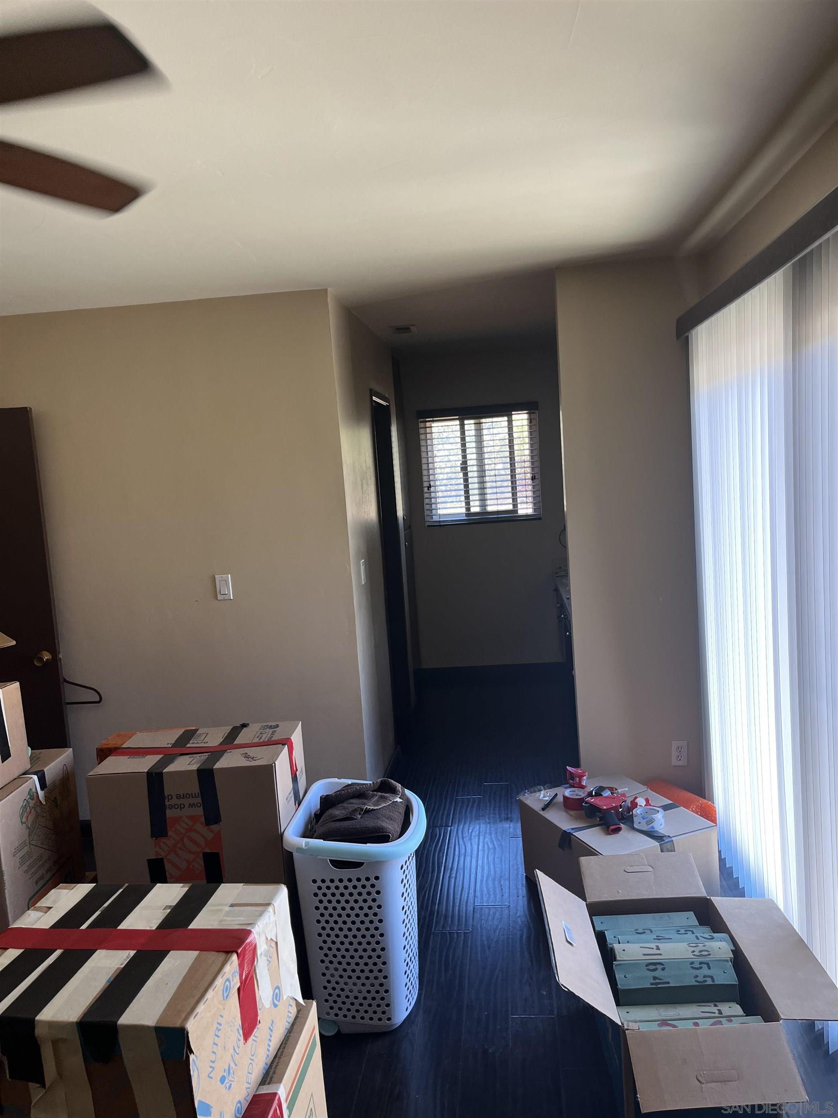 1407 Taylor Vista Vista, CA 92084 - Photo 23 of 28 a living room with furniture and a window