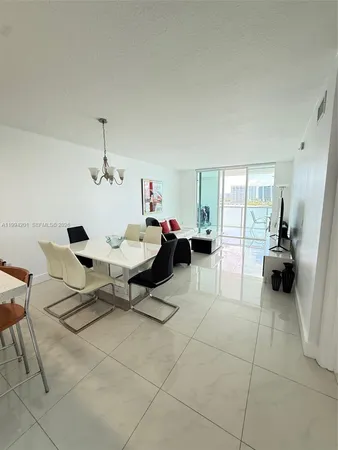 a living room with furniture and a view of living room