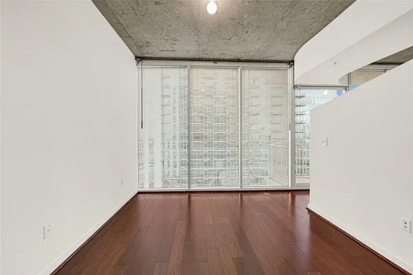 a view of a hallway with washer and dryer