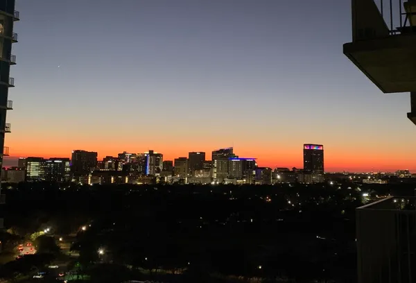 a front view of a building with street view