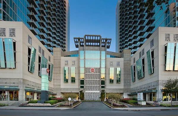 a view of kitchen with furniture and a refrigerator