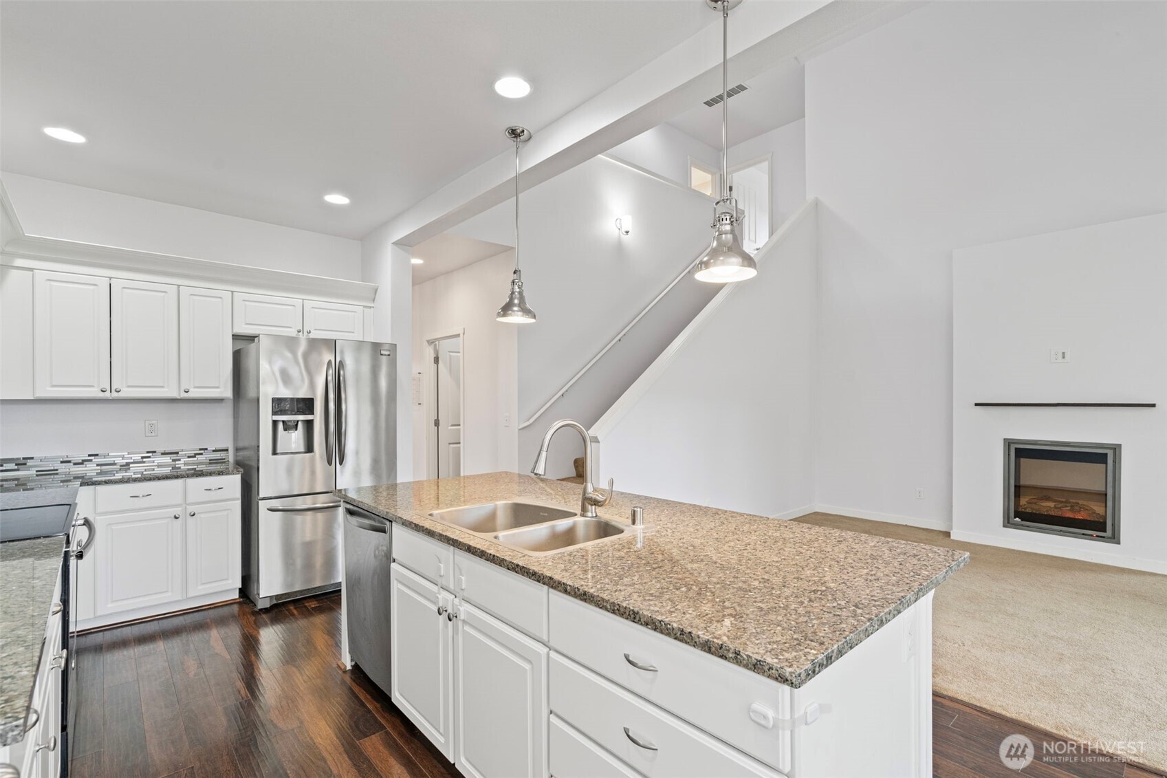 254 Parkside Loop Chehalis, WA 98532 - Photo 13 of 40 a kitchen with stainless steel appliances granite countertop a refrigerator and a sink