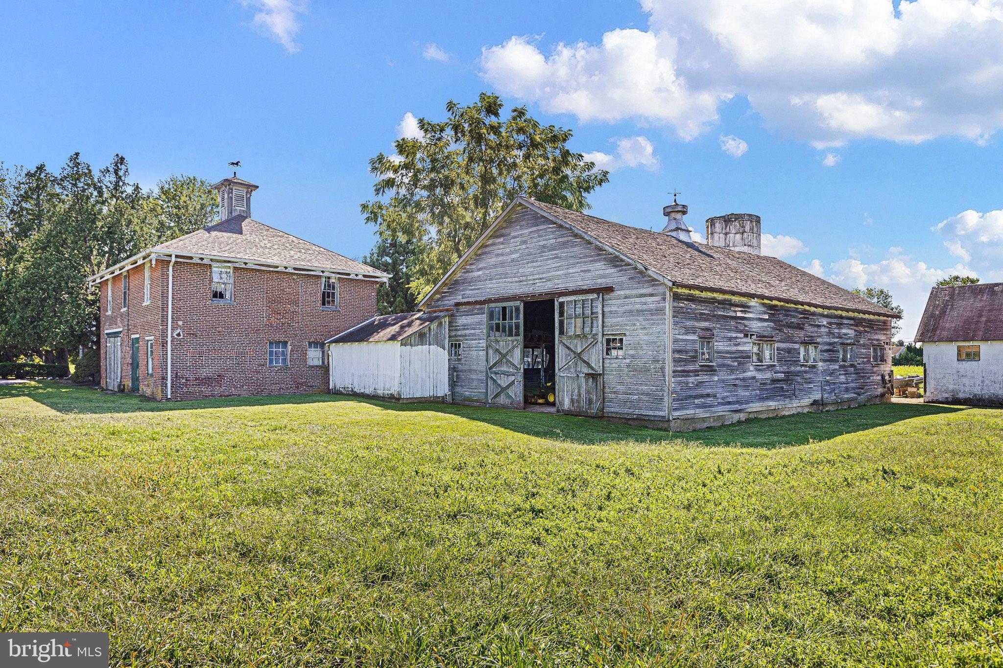 692 Bayview Road Middletown, DE 19709 - Photo 15 of 37 a view of a house with a garden and yard