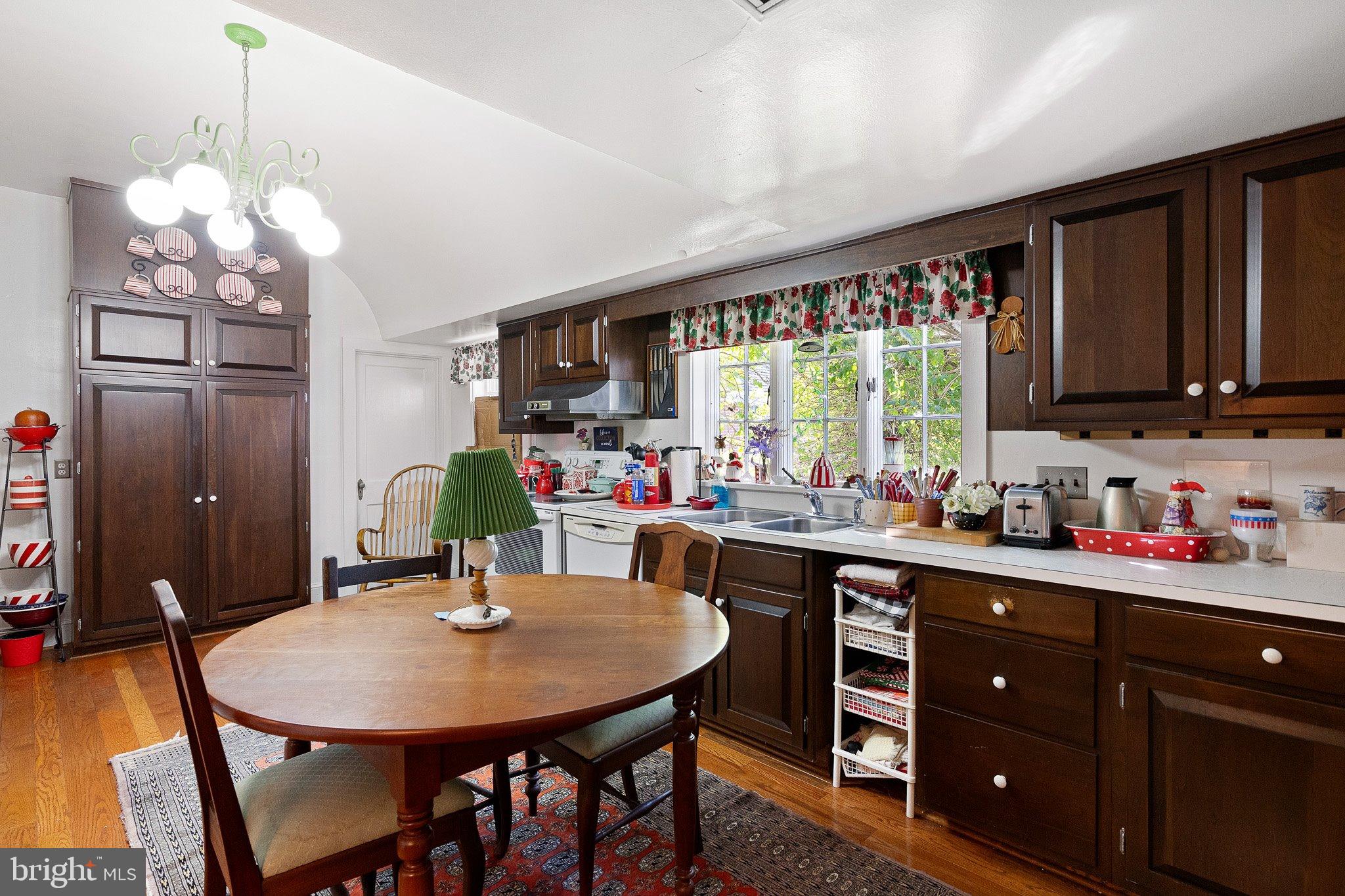 692 Bayview Road Middletown, DE 19709 - Photo 20 of 37 a kitchen with a table and chairs in it