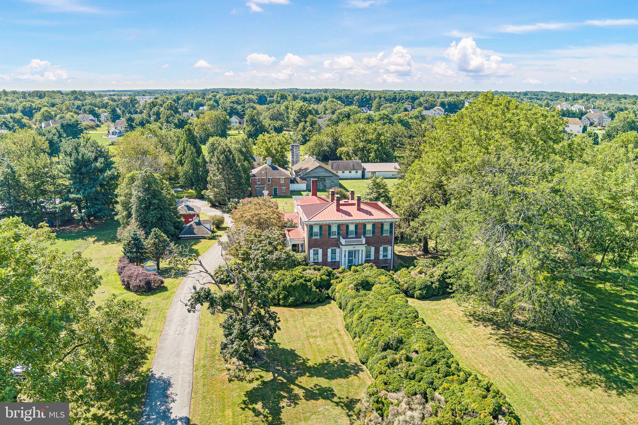 692 Bayview Road Middletown, DE 19709 - Photo 3 of 37 a view of a garden with an outdoor seating