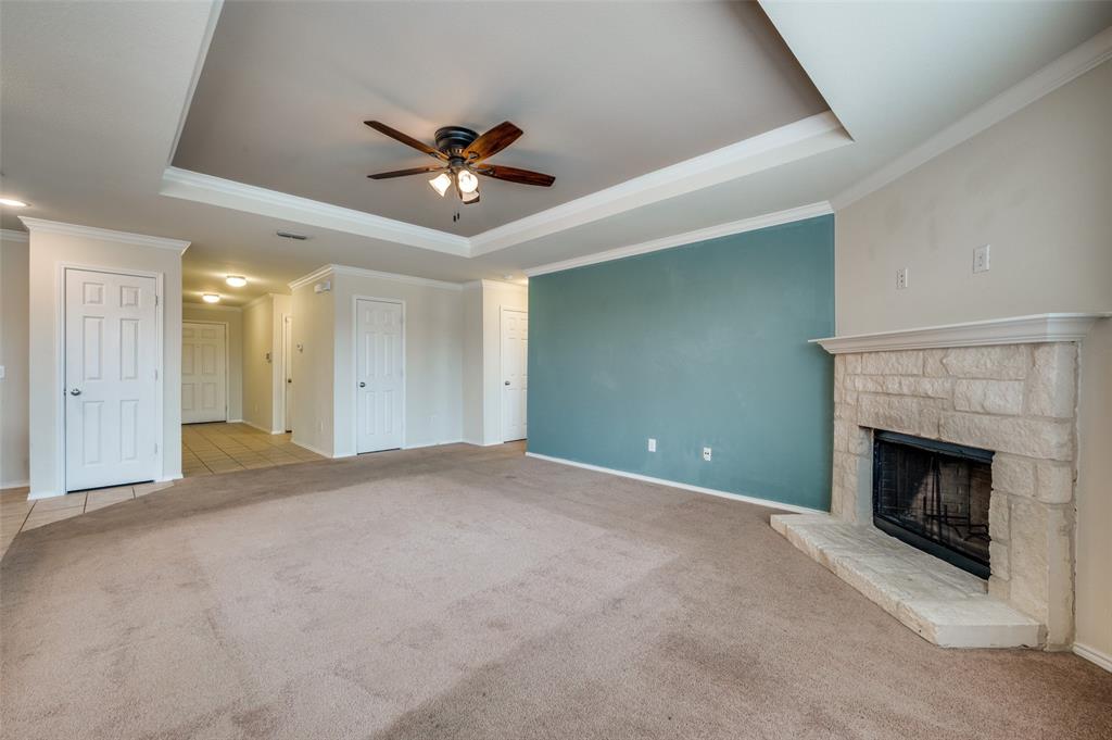 1420 Rivers Creek Lane Little Elm, TX 75068 - Photo 4 of 25 a view of an empty room with a fireplace