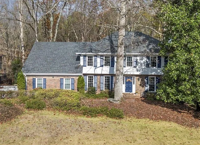 front view of a house with a yard