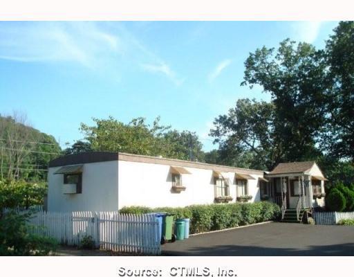 Exterior Front. 1,076 SF, 2 BR MOBILE HOME IN WELL-MAINTAINED PARK.
