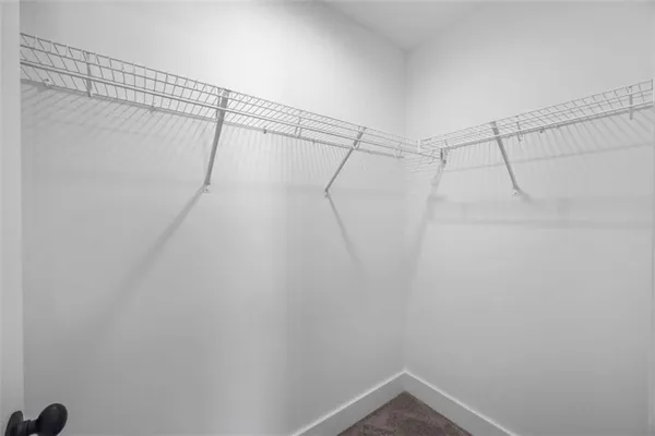 a view of a room with racks on the wall
