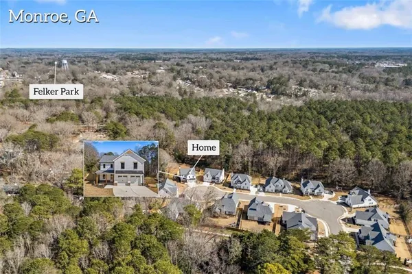 an aerial view of residential building with parking space
