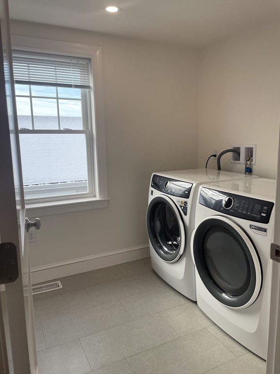 29 Crescent Road, Unit 29 Belmont, MA 02478 - Photo 20 of 21 a utility room with dryer and washer