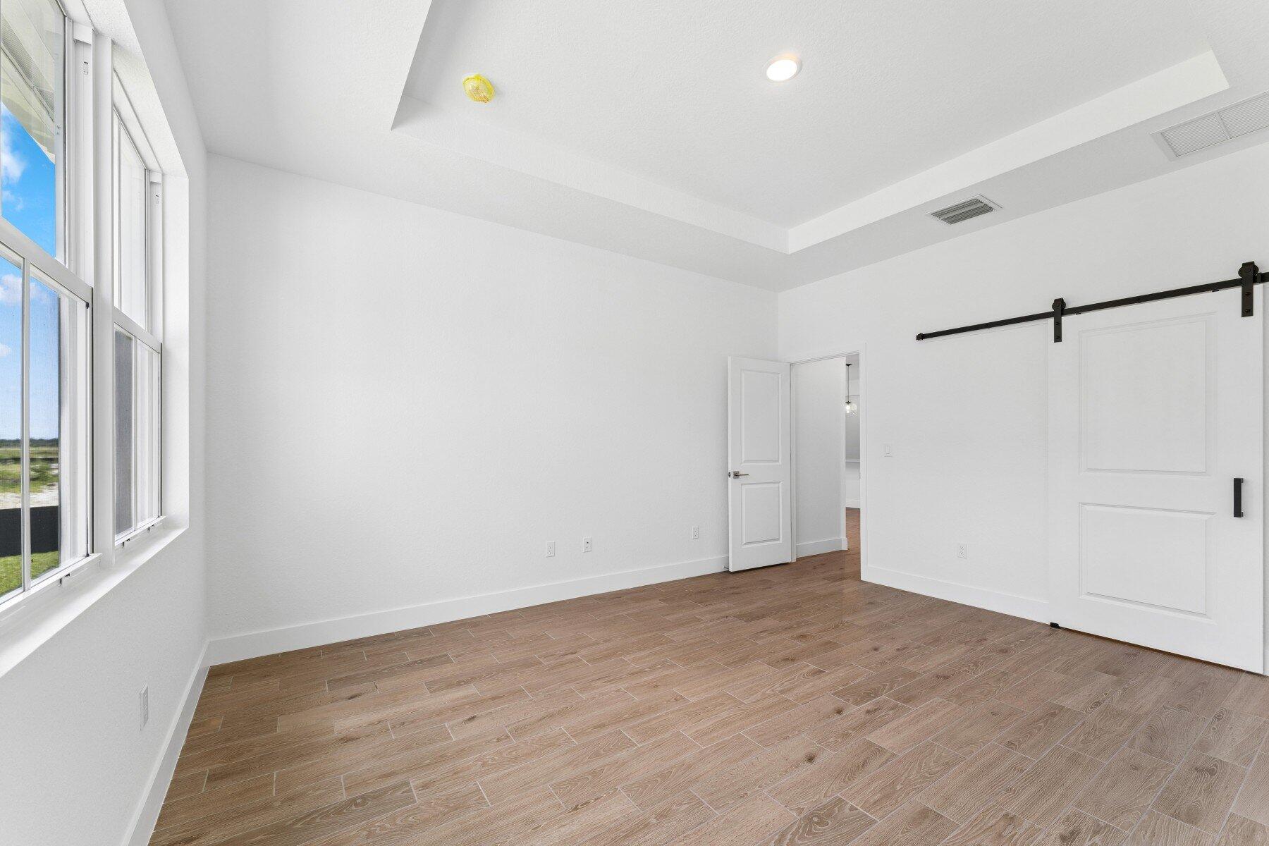 10091 Dreamweaver Road, Unit 52 Port St. Lucie, FL 34987 - Photo 20 of 39 Primary Suite