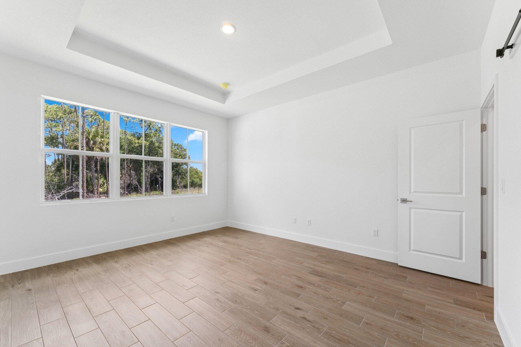10091 Dreamweaver Road, Unit 52 Port St. Lucie, FL 34987 - Photo 21 of 39 Primary Suite