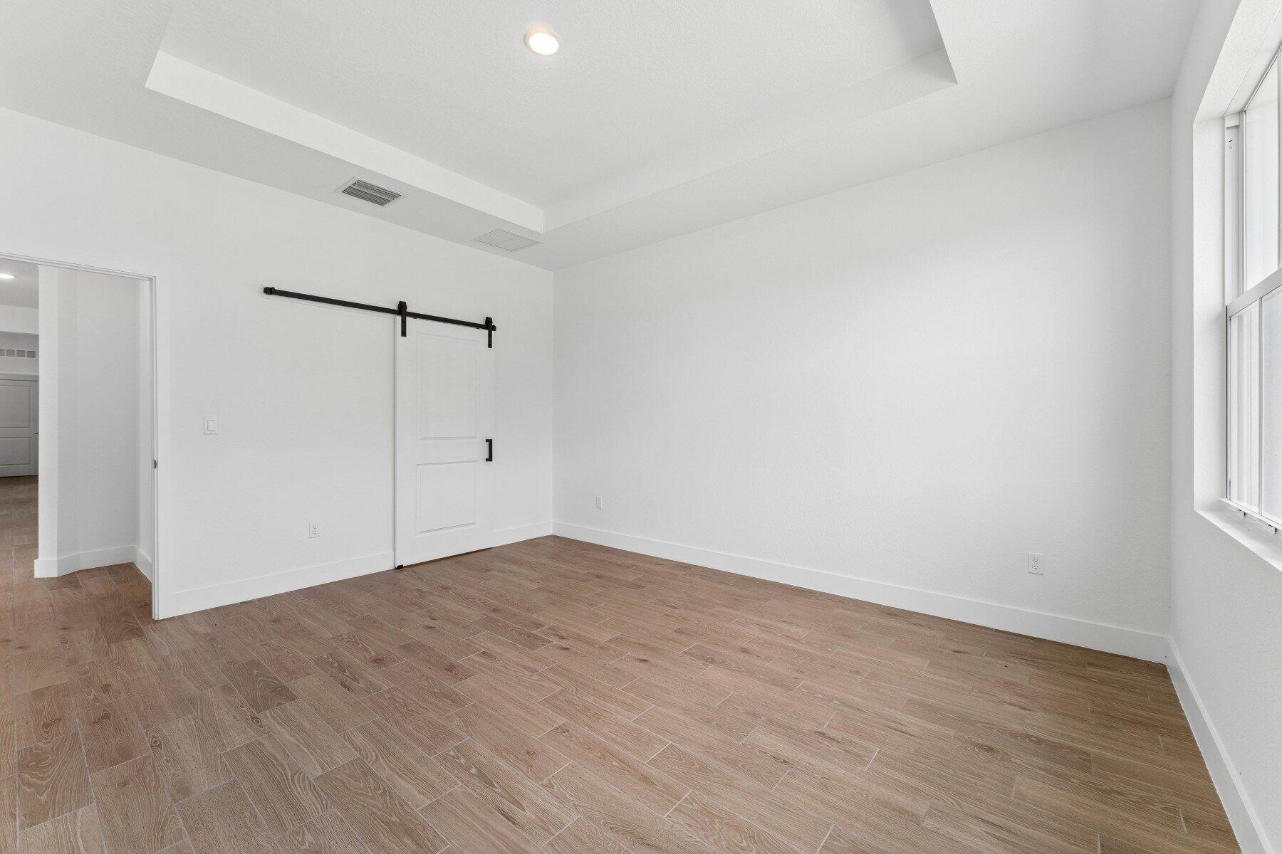10091 Dreamweaver Road, Unit 52 Port St. Lucie, FL 34987 - Photo 23 of 39 Primary Suite