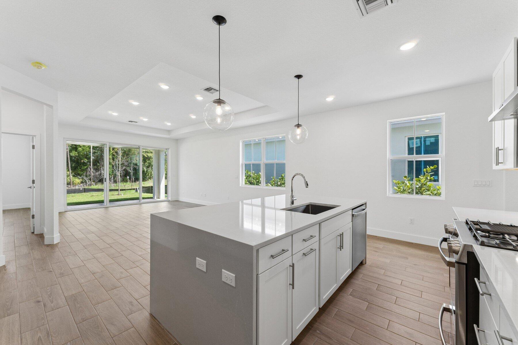 10091 Dreamweaver Road, Unit 52 Port St. Lucie, FL 34987 - Photo 5 of 39 Kitchen, Dining Area & Great Room