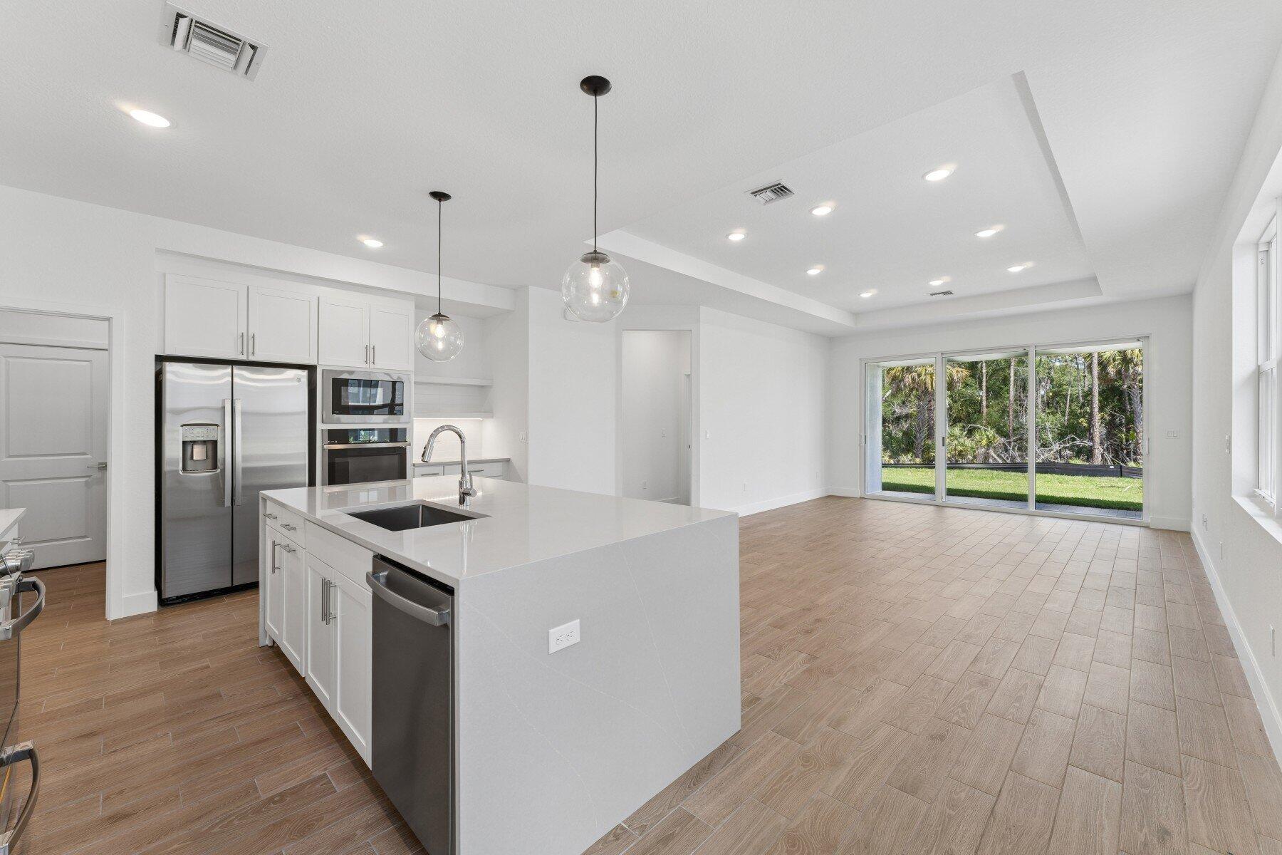 10091 Dreamweaver Road, Unit 52 Port St. Lucie, FL 34987 - Photo 10 of 39 Kitchen, Dining Area & Great Room