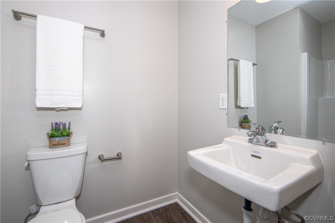 1001 Red House Road Ford, VA 23850 - Photo 11 of 20 a bathroom with a sink toilet and a mirror
