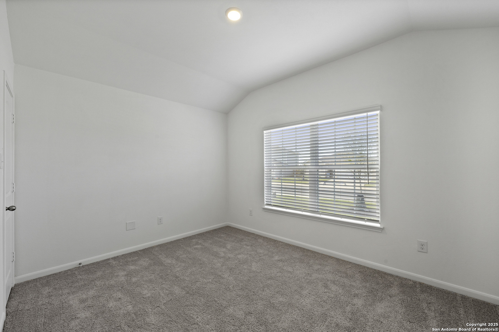 16021 Stratford Cove Lytle, TX 78052 - Photo 14 of 30 an empty room with a window