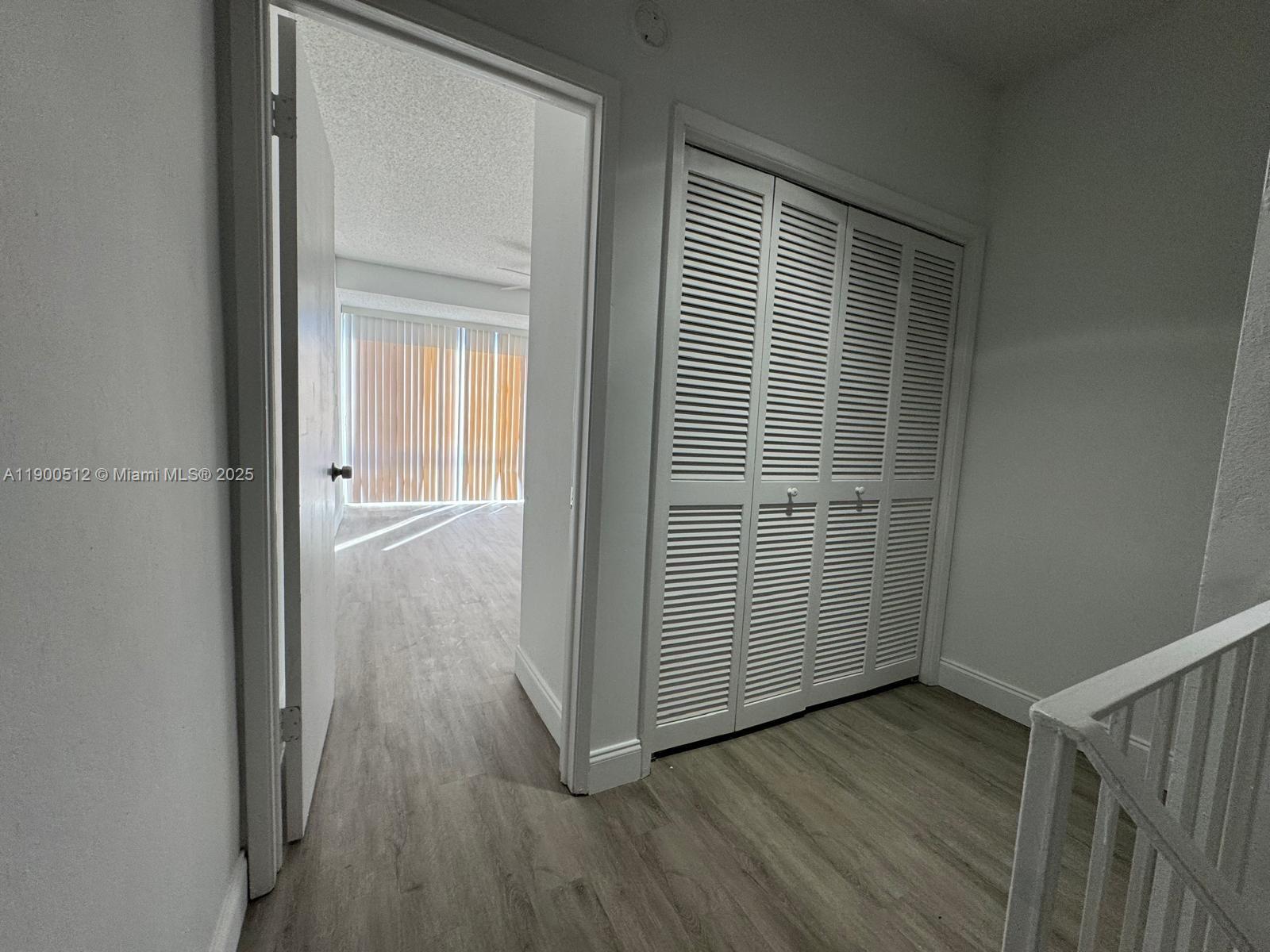 9155 Fontainebleau Boulevard, Unit 5 Miami, FL 33172 - Photo 17 of 18 a view of wooden floor