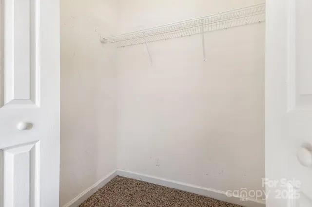 a bathroom with a sink a toilet a shower and a mirror