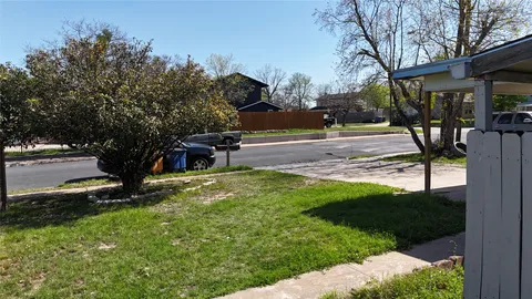 a view of a garden with a bench