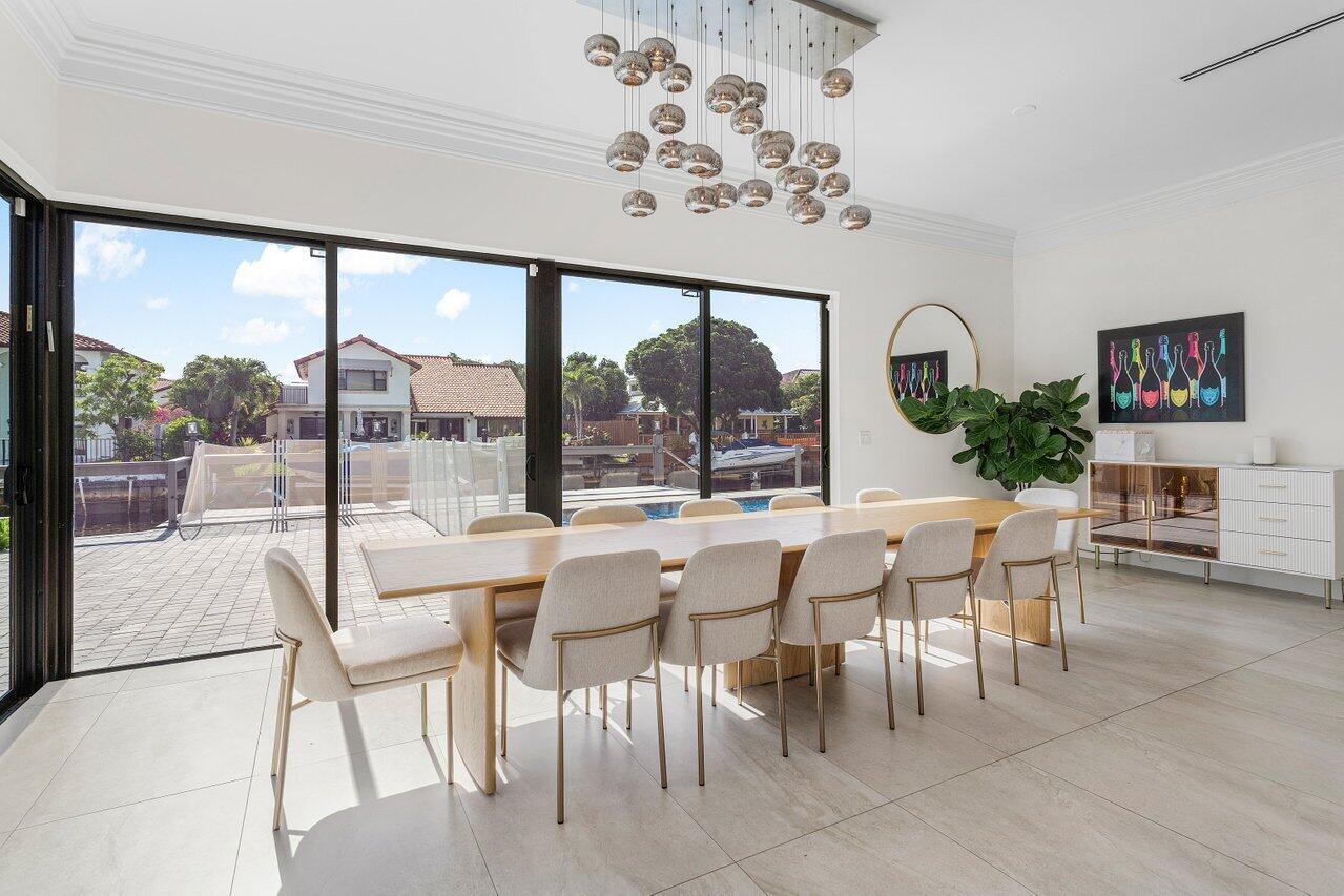 1536 Southwest 5th Avenue Boca Raton, FL 33432 - Photo 12 of 37 a view of a dining room with furniture window and outside view