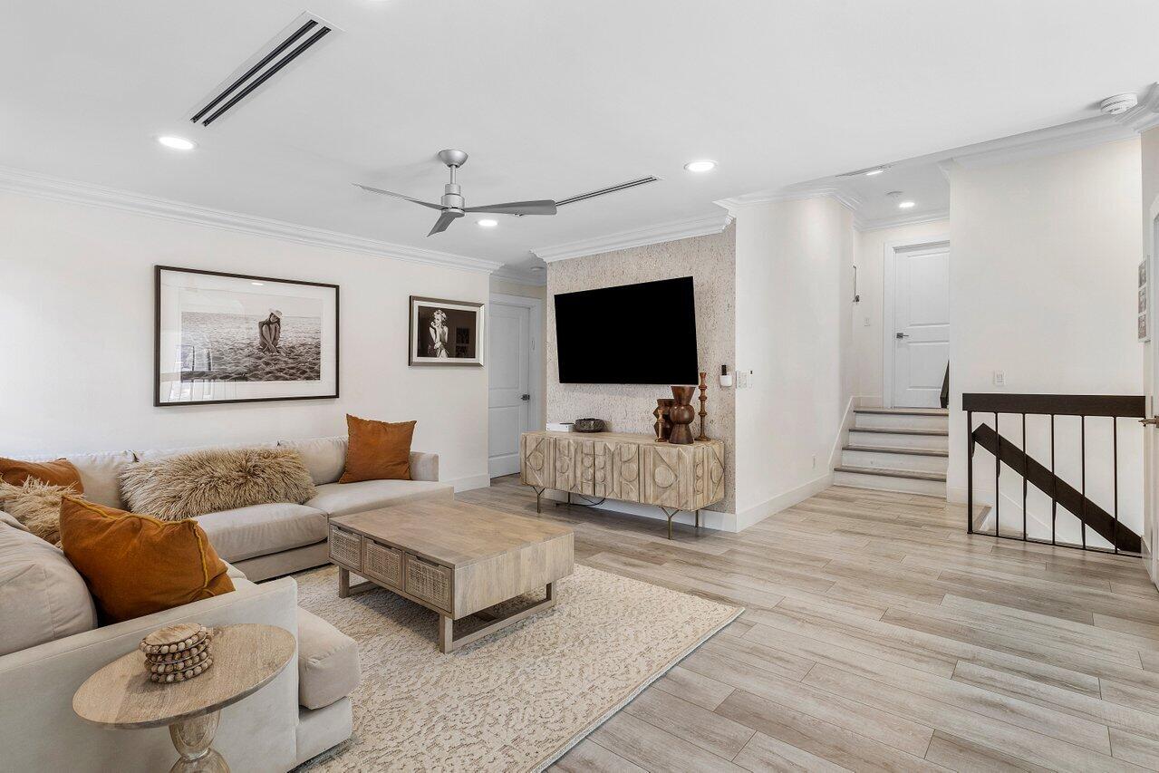1536 Southwest 5th Avenue Boca Raton, FL 33432 - Photo 27 of 37 a living room with furniture and a flat screen tv