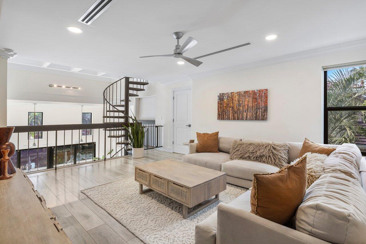 1536 Southwest 5th Avenue Boca Raton, FL 33432 - Photo 28 of 37 a living room with furniture and a wooden floor