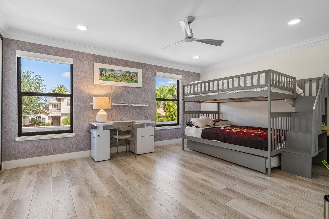 1536 Southwest 5th Avenue Boca Raton, FL 33432 - Photo 30 of 37 a bedroom with furniture and windows