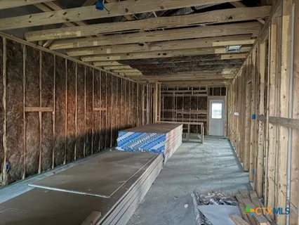 a view of a balcony with chairs