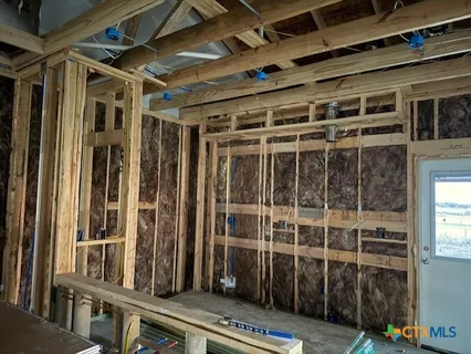 a view of a balcony with wooden floor