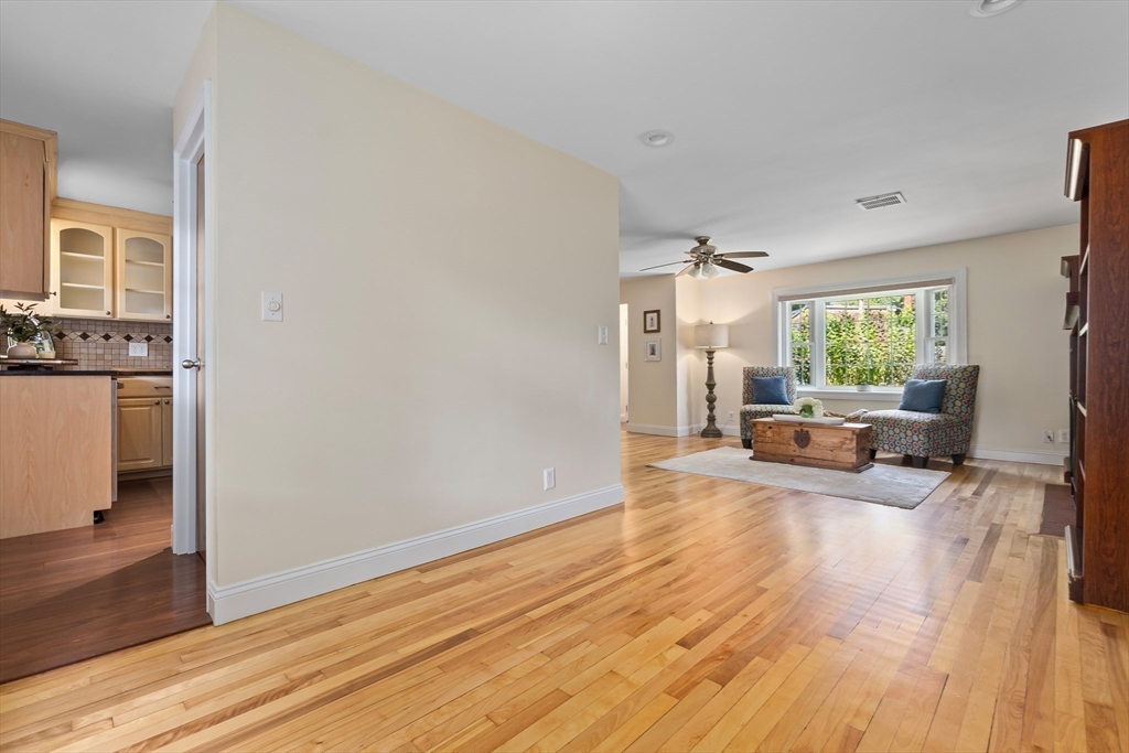 27 May Street Marblehead, MA 01945 - Photo 12 of 34 a living room with furniture and a wooden floor