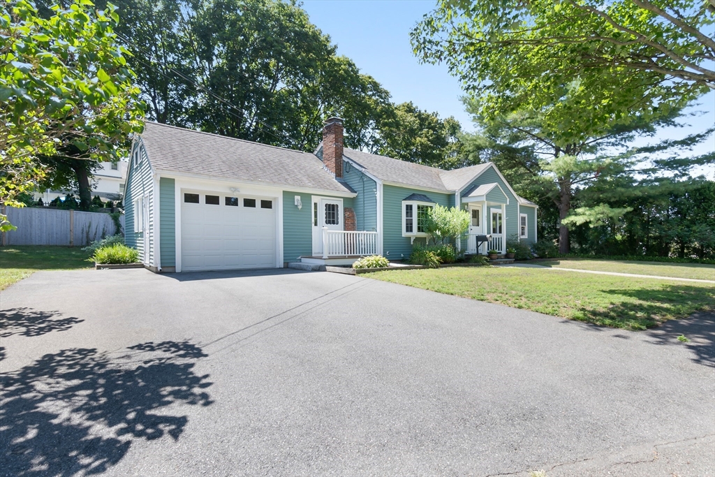 27 May Street Marblehead, MA 01945 - Photo 2 of 34 a view of house with a yard and large trees
