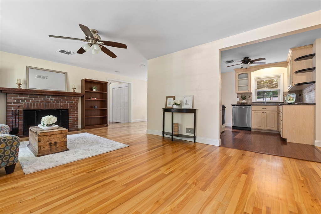27 May Street Marblehead, MA 01945 - Photo 6 of 34 a living room with furniture and a fireplace