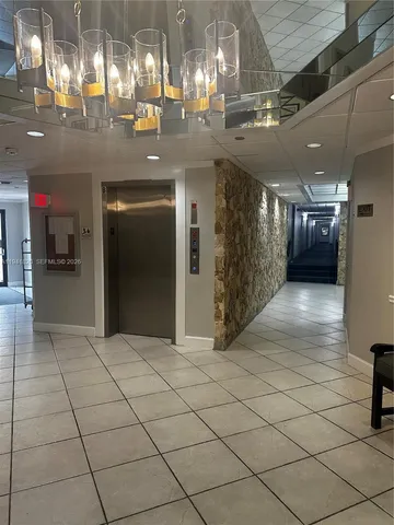a view of a hallway with entryway