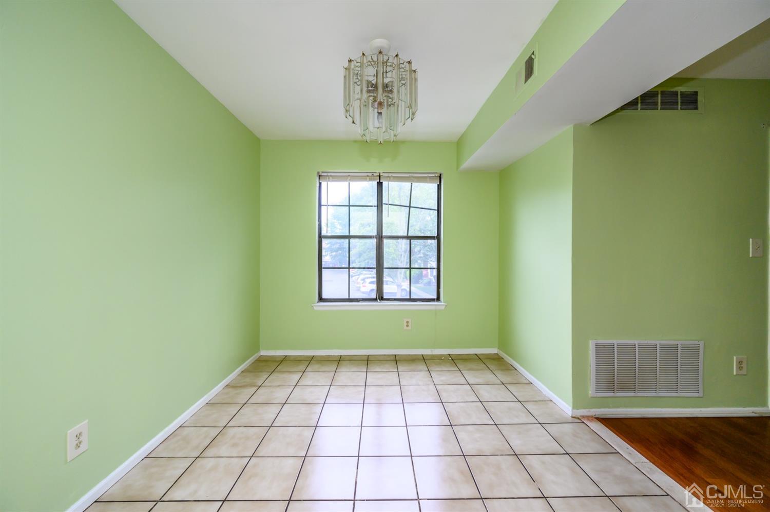 44 Boulder Drive Edison, NJ 08817 - Photo 9 of 21 a view of an empty room and window