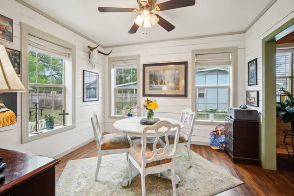 a kitchen with a stove top oven sink and cabinets