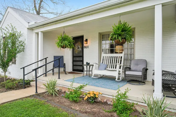 a garden view with a seating space