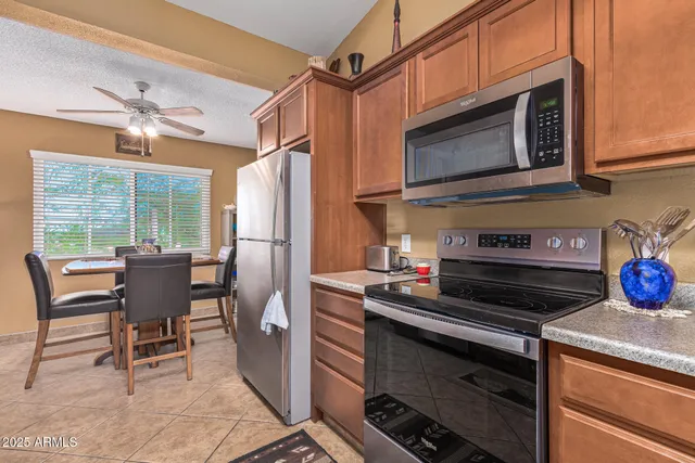 a kitchen with a stove and a microwave