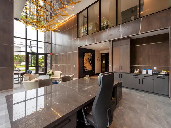 a kitchen with a table and chairs in it