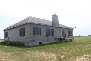8585 Campbell Road Bay Port, MI 48720 - Photo 9 of 11 Back view of home.jpg