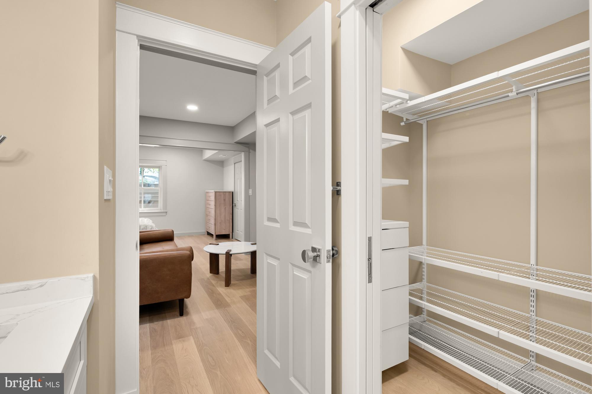 4111 18th Road North, Unit 1 Arlington, VA 22207 - Photo 11 of 16 a en suite bathroom with a sink and a mirror