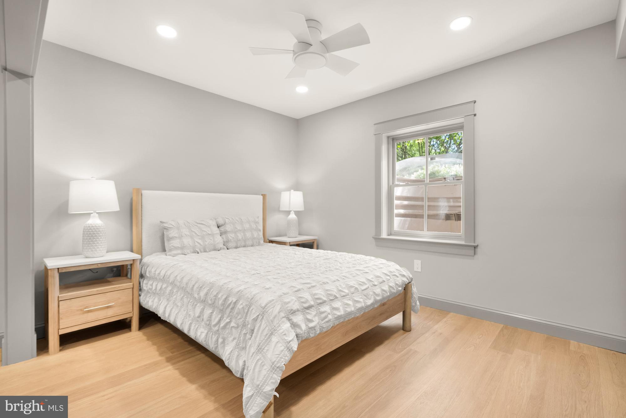 4111 18th Road North, Unit 1 Arlington, VA 22207 - Photo 7 of 16 a bedroom with a bed and a window