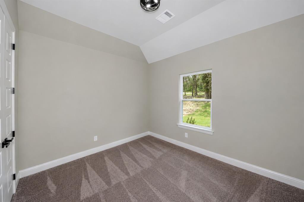 1057 Vh Ranch Poolville, TX 76487 - Photo 25 of 38 an empty room with window