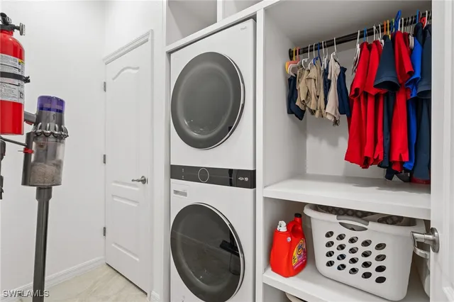 a view of a closet and utility room