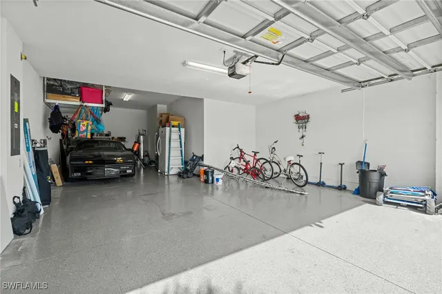 a view of a garage with a bike and furniture