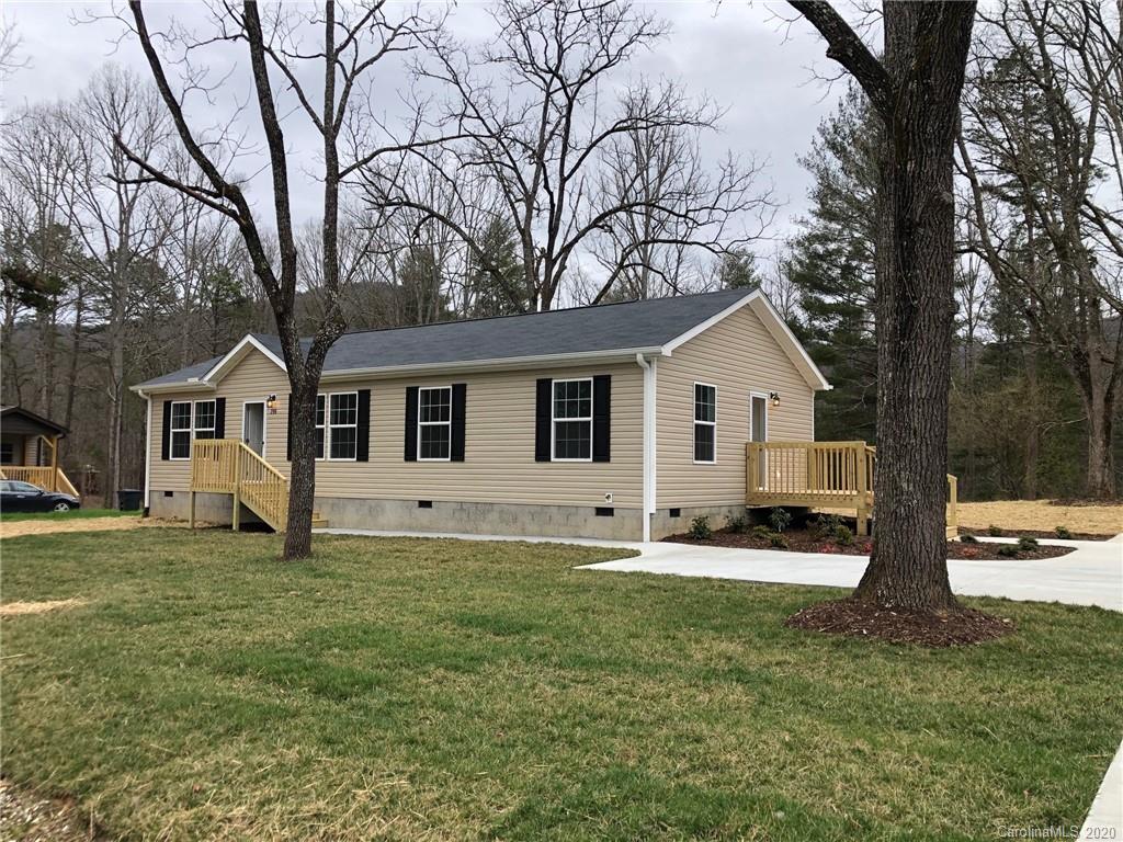 296 Souther Road Fletcher, NC 28732 - Photo 1 of 25 a front view of a house with a yard